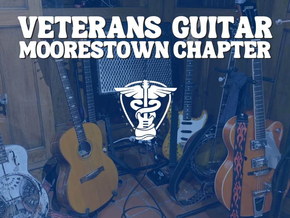 Photo of Guitars with text "Veterans Guitar Moorestown Chapter"
